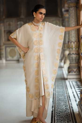 Dash And Dot White Viscose, Lurex Brocade Draped Skirt Online at Aza Fashions Dash And Dot_White Viscose, Lurex Brocade Draped Skirt _Online_at_Aza_Fashions