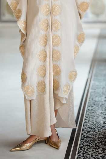 Dash And Dot White Viscose, Lurex Brocade Draped Skirt at Aza Fashions Dash And Dot_White Viscose, Lurex Brocade Draped Skirt _at_Aza_Fashions