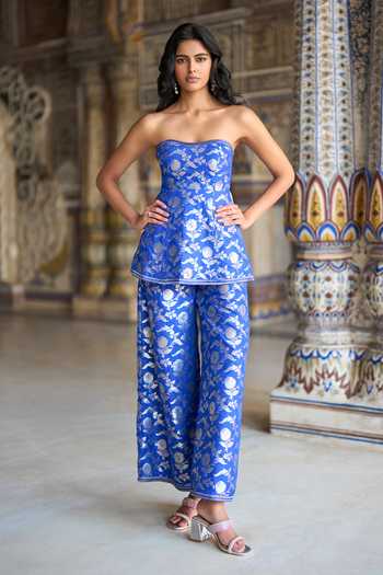 Dash And Dot_Blue Brocade Bandeau Neck Banarasi Peplum Corset Top And Pant Set _Online_at_Aza_Fashions