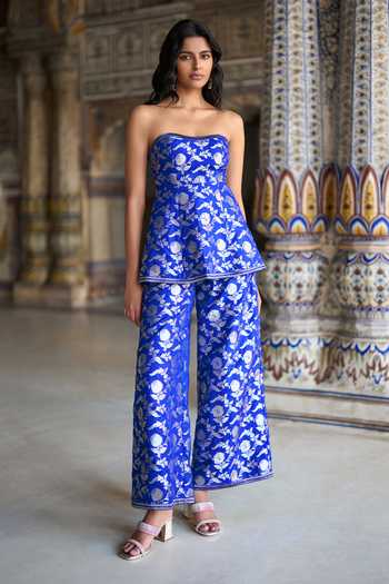 Dash And Dot_Blue Brocade Bandeau Neck Banarasi Peplum Corset Top And Pant Set _at_Aza_Fashions