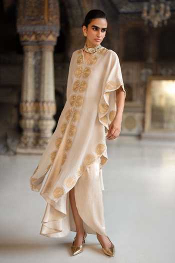 Dash And Dot White Viscose, Lurex V-neck Embroidered Kaftan Top And Brocade Draped Skirt Set Online at Aza Fashions Dash And Dot_White Viscose, Lurex V-neck Embroidered Kaftan Top And Brocade Draped Skirt Set _Online_at_Aza_Fashions