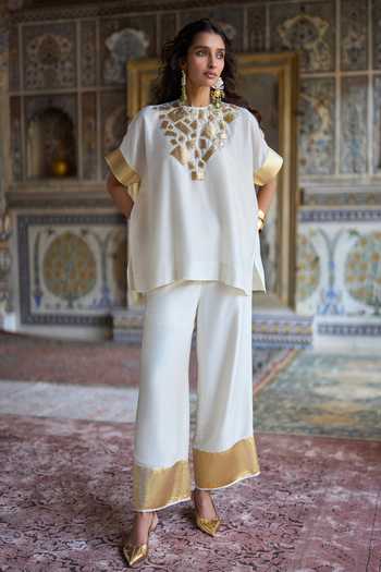 Dash And Dot Ivory Viscose Round Neck Gota Applique Boxy Top Online at Aza Fashions Dash And Dot_Ivory Viscose Round Neck Gota Applique Boxy Top _Online_at_Aza_Fashions