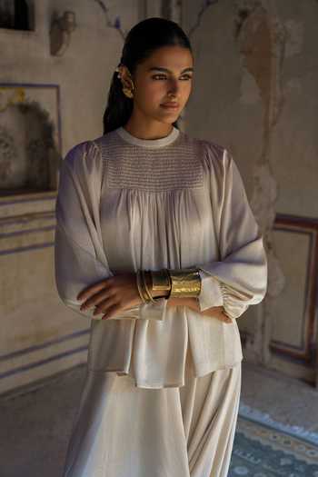 Dash And Dot_Ivory Polyester Round Neck Embroidered Bib And Cowl Draped Pant Set _Online_at_Aza_Fashions
