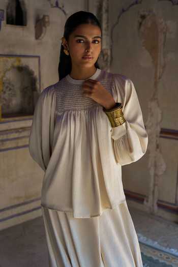 Dash And Dot White Polyester Round Neck Smocked Top And Cowl Draped Pant Set Online at Aza Fashions Dash And Dot_White Polyester Round Neck Smocked Top And Cowl Draped Pant Set _Online_at_Aza_Fashions