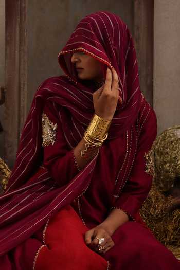 Aurouss Maroon Silk Round Neck Rajasi Embroidered Anarkali Sharara Set at Aza Fashions Aurouss_Maroon Silk Round Neck Rajasi Embroidered Anarkali Sharara Set _at_Aza_Fashions