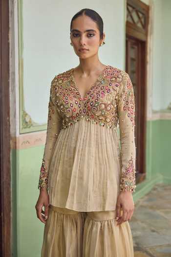 Shop Tamanna Punjabi Kapoor Gold Tissue V-neck Nazia Embroidered Kurta Gharara Set Online at Aza Fashions Shop_Tamanna Punjabi Kapoor_Gold Tissue V-neck Nazia Embroidered Kurta Gharara Set _Online_at_Aza_Fashions