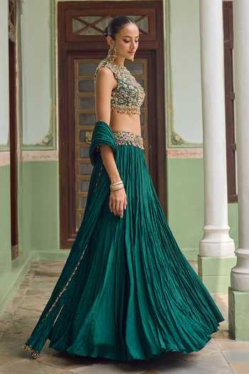 Tamanna Punjabi Kapoor Emerald Green Silk High Neck Rihaa Crushed Lehenga Set Online at Aza Fashions Tamanna Punjabi Kapoor_Emerald Green Silk High Neck Rihaa Crushed Lehenga Set _Online_at_Aza_Fashions