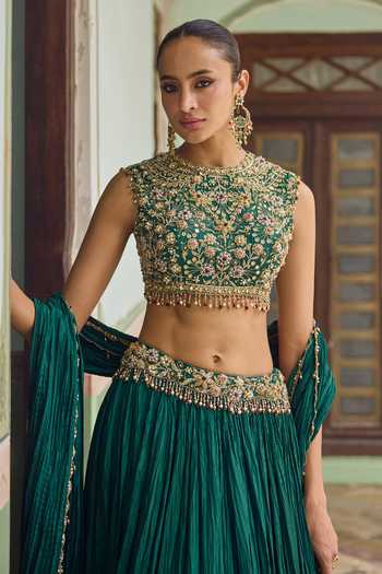Shop Tamanna Punjabi Kapoor Emerald Green Silk High Neck Rihaa Crushed Lehenga Set Online at Aza Fashions Shop_Tamanna Punjabi Kapoor_Emerald Green Silk High Neck Rihaa Crushed Lehenga Set _Online_at_Aza_Fashions