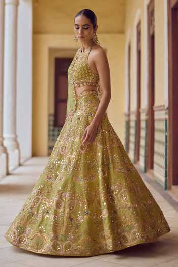 Buy Tamanna Punjabi Kapoor Yellow Raw Silk, Net Halter Neck Sitaara Embroidered Lehenga Set Online at Aza Fashions Buy_Tamanna Punjabi Kapoor_Yellow Raw Silk, Net Halter Neck Sitaara Embroidered Lehenga Set _Online_at_Aza_Fashions