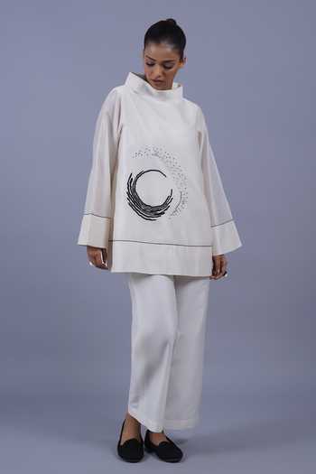 Buy Taika By Poonam Bhagat Ivory Chanderi Mandarin Collar Crescent Placement Embroidered Top Online at Aza Fashions Buy_Taika By Poonam Bhagat_Ivory Chanderi Mandarin Collar Crescent Placement Embroidered Top _Online_at_Aza_Fashions