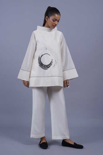 Shop Taika By Poonam Bhagat Ivory Chanderi Mandarin Collar Crescent Placement Embroidered Top Online at Aza Fashions Shop_Taika By Poonam Bhagat_Ivory Chanderi Mandarin Collar Crescent Placement Embroidered Top _Online_at_Aza_Fashions