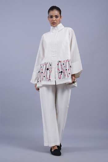 Taika By Poonam Bhagat_Ivory Chanderi Mandarin Collar Ribbons Border Embroidered Top _Online_at_Aza_Fashions