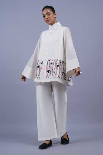 Buy_Taika By Poonam Bhagat_Ivory Chanderi Mandarin Collar Ribbons Border Embroidered Top _Online_at_Aza_Fashions
