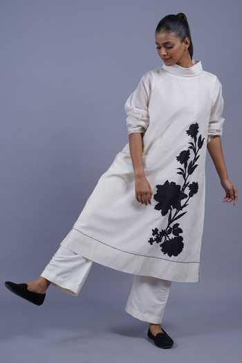 Taika By Poonam Bhagat_Ivory Chanderi Mandarin Collar Jasmine Placement Embroidered Kurta And Pant Set _at_Aza_Fashions