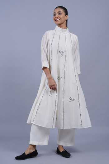 Shop_Taika By Poonam Bhagat_Ivory Chanderi Mandarin Collar, Yes Spring Embroidered Kurta And Pant Set _Online_at_Aza_Fashions