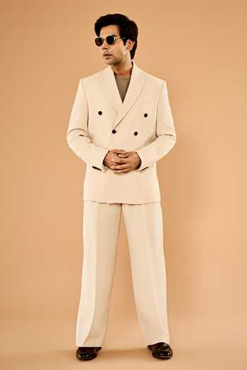 Nirmooha Beige Microfiber Caelum Double Breasted Blazer And Pant Set at Aza Fashions Nirmooha_Beige Microfiber Caelum Double Breasted Blazer And Pant Set _at_Aza_Fashions