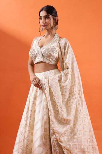 Buy Azeera Off White Brocade V-neck Floral Woven Lehenga Set Online at Aza Fashions Buy_Azeera_Off White Brocade V-neck Floral Woven Lehenga Set _Online_at_Aza_Fashions