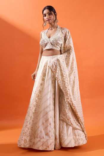 Azeera Off White Brocade V-neck Floral Woven Lehenga Set at Aza Fashions Azeera_Off White Brocade V-neck Floral Woven Lehenga Set _at_Aza_Fashions