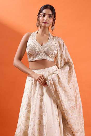 Buy Azeera Off White Brocade V-neck Floral Woven Lehenga Set Buy_Azeera_Off White Brocade V-neck Floral Woven Lehenga Set