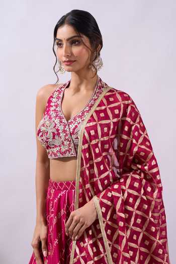 Buy Azeera Fuchsia Brocade Halter Neck Woven Hand Embroidered Lehenga Set Buy_Azeera_Fuchsia Brocade Halter Neck Woven Hand Embroidered Lehenga Set