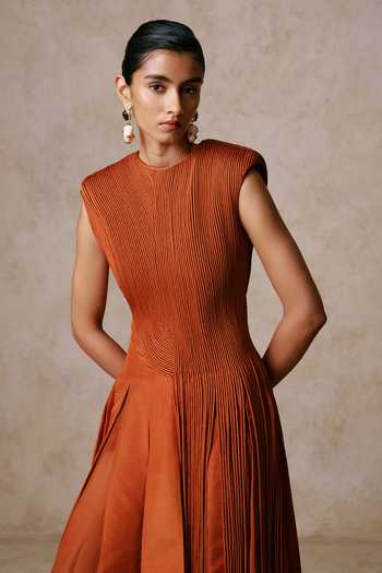 Nirmooha Orange Taffeta Tassels Round Neck Filament Cascading Corded Gown at Aza Fashions Nirmooha_Orange Taffeta Tassels Round Neck Filament Cascading Corded Gown _at_Aza_Fashions