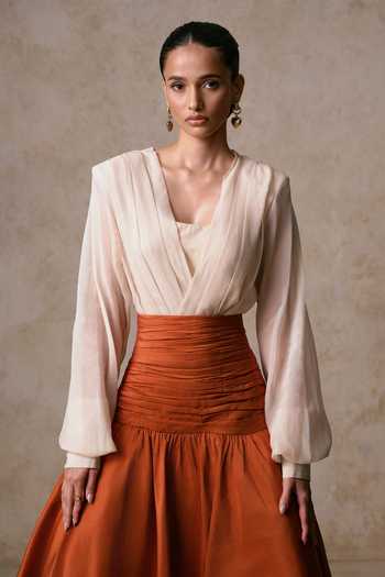 Shop Nirmooha Ivory Organza, Taffeta Open Neck Counterpoise Draped Blouse And Midi Skirt Set Online at Aza Fashions Shop_Nirmooha_Ivory Organza, Taffeta Open Neck Counterpoise Draped Blouse And Midi Skirt Set _Online_at_Aza_Fashions