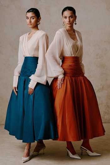 Buy Nirmooha Ivory Organza V-neck Equipoise Draped Blouse And Midi Skirt Set Online at Aza Fashions Buy_Nirmooha_Ivory Organza V-neck Equipoise Draped Blouse And Midi Skirt Set _Online_at_Aza_Fashions