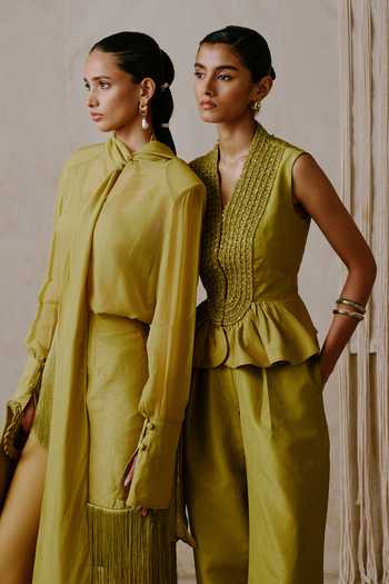 Shop Nirmooha Olive Green Taffeta V-neck Interplay Peplum Vest With Barrel Trouser Online at Aza Fashions Shop_Nirmooha_Olive Green Taffeta V-neck Interplay Peplum Vest With Barrel Trouser _Online_at_Aza_Fashions