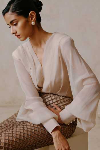 Buy Nirmooha Ivory Organza, Net V-neck Interlace Draped Blouse And Textured Mesh Skirt Set Online at Aza Fashions Buy_Nirmooha_Ivory Organza, Net V-neck Interlace Draped Blouse And Textured Mesh Skirt Set _Online_at_Aza_Fashions