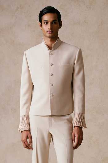 Nirmooha Ivory Still Structured Bandhgala Set Online at Aza Fashions Nirmooha_Ivory Still Structured Bandhgala Set _Online_at_Aza_Fashions