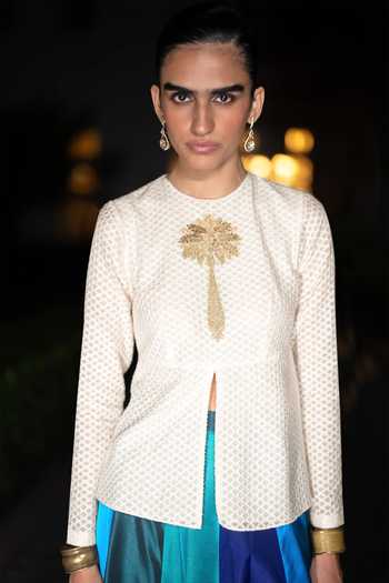 Shop Dash And Dot Ivory Cotton, Viscose, Nylon Round Embroidered Peplum Top And Panelled Skirt Set Online at Aza Fashions Shop_Dash And Dot_Ivory Cotton, Viscose, Nylon Round Embroidered Peplum Top And Panelled Skirt Set _Online_at_Aza_Fashions