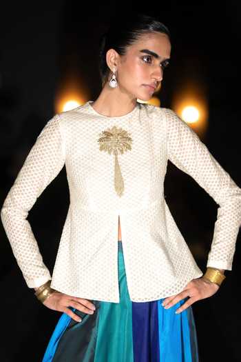 Dash And Dot Ivory Cotton, Viscose, Nylon Round Embroidered Peplum Top And Panelled Skirt Set at Aza Fashions Dash And Dot_Ivory Cotton, Viscose, Nylon Round Embroidered Peplum Top And Panelled Skirt Set _at_Aza_Fashions