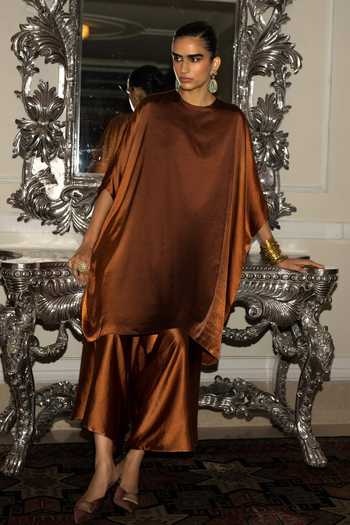 Dash And Dot Brown Polyester Round Neck Flowy Ombre Cape Tunic And Draped Culotte Pant at Aza Fashions Dash And Dot_Brown Polyester Round Neck Flowy Ombre Cape Tunic And Draped Culotte Pant _at_Aza_Fashions