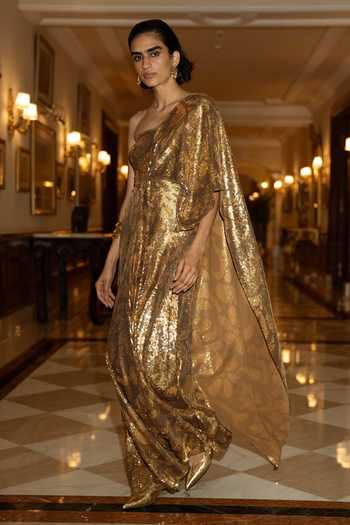 Dash And Dot_Gold Polyester Embroidery, Sequins One Shoulder Draped Saree Gown _Online_at_Aza_Fashions