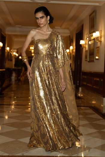 Dash And Dot_Gold Polyester Embroidery, Sequins One Shoulder Draped Saree Gown _at_Aza_Fashions