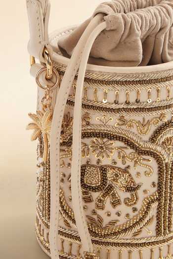 The Leather Garden_Gold Embroidery, Beads, Zari, Tassels Vanya Potli Bucket Bag _at_Aza_Fashions