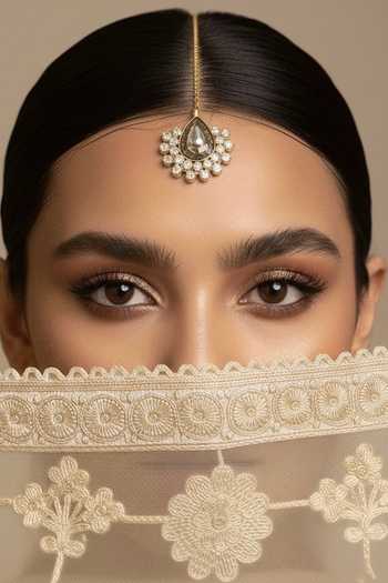 Buy_Ornamaas_White Pear Shaped Crystal Stone Maangtikka _Online_at_Aza_Fashions