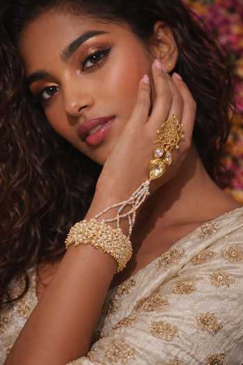 Shop Ornamaas White Jhalar Accents Pearl Hathphool - Single Pc Online at Aza Fashions Shop_Ornamaas_White Jhalar Accents Pearl Hathphool - Single Pc _Online_at_Aza_Fashions