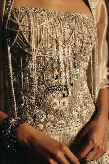 Mahima Mahajan Silver Silk, Tissue Sequins, Beads, Fringe Samiya Embroidered Corset Lehenga Set at Aza Fashions Mahima Mahajan_Silver Silk, Tissue Sequins, Beads, Fringe Samiya Embroidered Corset Lehenga Set _at_Aza_Fashions