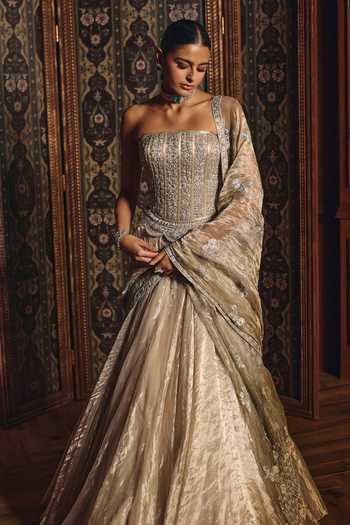 Shop Mahima Mahajan Silver Silk, Tissue Beads, Sequins Bandeau Mahika Embroidered Corset Lehenga Set Online at Aza Fashions Shop_Mahima Mahajan_Silver Silk, Tissue Beads, Sequins Bandeau Mahika Embroidered Corset Lehenga Set _Online_at_Aza_Fashions