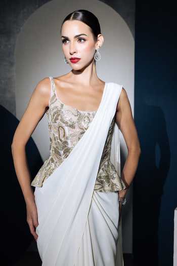 Buy Ritika Mirchandani Ivory Crepe, Net Crystals Scoop Neck Maelle Draped Lehenga Saree With Corset Online at Aza Fashions Buy_Ritika Mirchandani_Ivory Crepe, Net Crystals Scoop Neck Maelle Draped Lehenga Saree With Corset _Online_at_Aza_Fashions