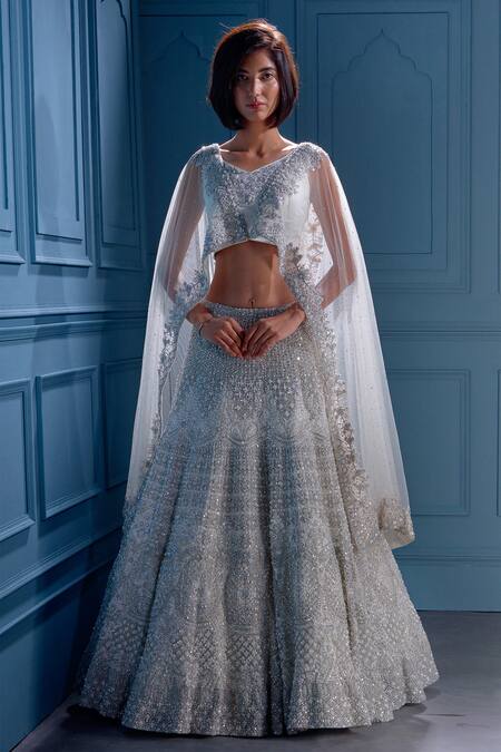 Angad Singh White Net Interlining Satin V Neck Embroidered Cape And Lehenga Set Online at Aza Fashions Angad Singh_White Net Interlining Satin V Neck Embroidered Cape And Lehenga Set _Online_at_Aza_Fashions
