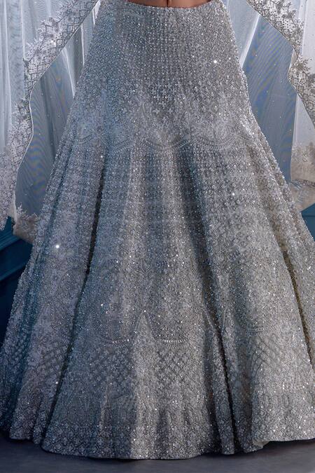 Angad Singh White Net Interlining Satin V Neck Embroidered Cape And Lehenga Set at Aza Fashions Angad Singh_White Net Interlining Satin V Neck Embroidered Cape And Lehenga Set _at_Aza_Fashions