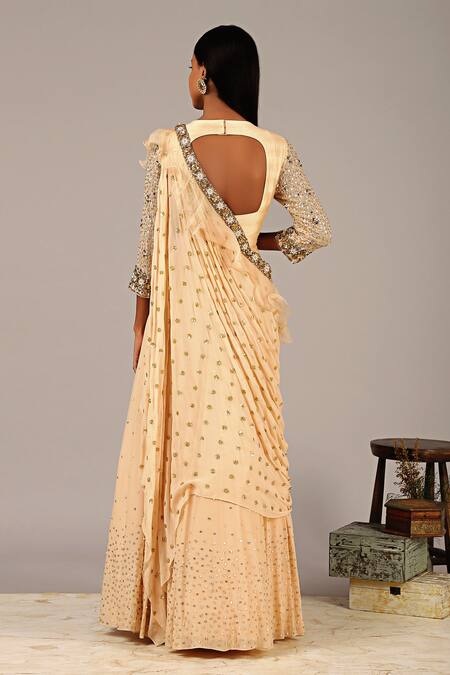 Shop_NIDHIKA SHEKHAR_Beige Georgette Crepe Silk Lining Shantoon Round Ruffle Draped Saree Gown _at_Aza_Fashions