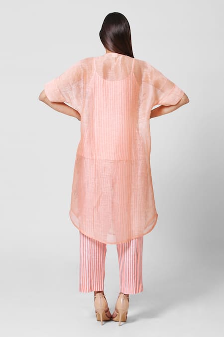 Shop Oja Peach 30% Silk, 70% Linen Round Kurta And Pant Set at Aza Fashions Shop_Oja_Peach 30% Silk, 70% Linen Round Kurta And Pant Set _at_Aza_Fashions
