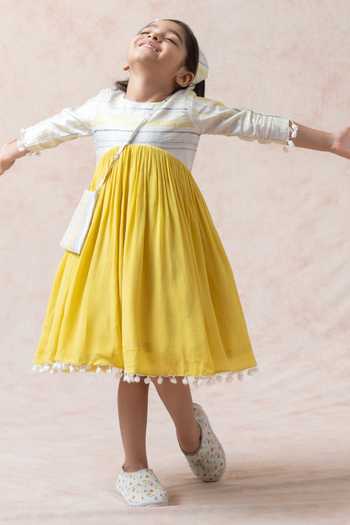 Thetaa Yellow Silk, Viscose, Voile Pom-poms Stripe Pattern Flared Dress Online at Aza Fashions Thetaa_Yellow Silk, Viscose, Voile Pom-poms Stripe Pattern Flared Dress _Online_at_Aza_Fashions