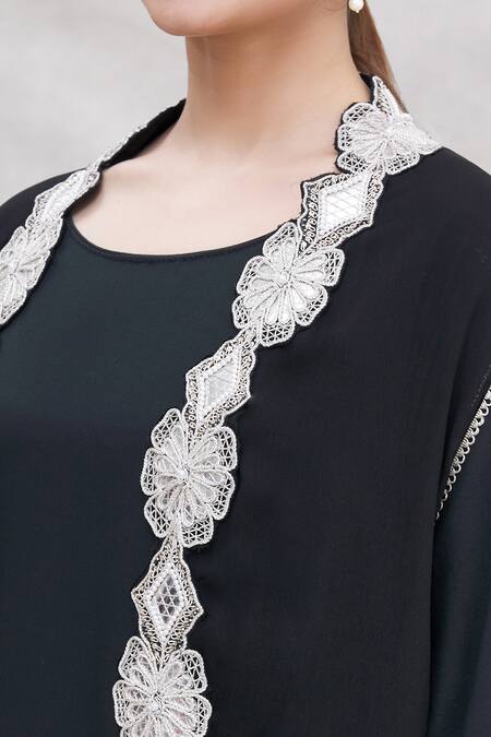 Ekta Singh_Black Georgette, Modal Round Asymmetric Floral Hem Cape And Dhoti Pant Set _at_Aza_Fashions