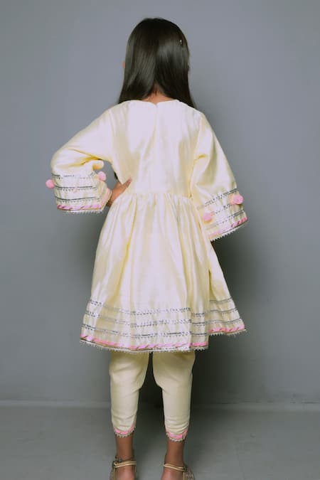 Shop Maaikid Yellow Chanderi, Cotton Pom-poms, Gota Patti Embroidered Kurta And Dhoti Pant Set at Aza Fashions Shop_Maaikid_Yellow Chanderi, Cotton Pom-poms, Gota Patti Embroidered Kurta And Dhoti Pant Set _at_Aza_Fashions