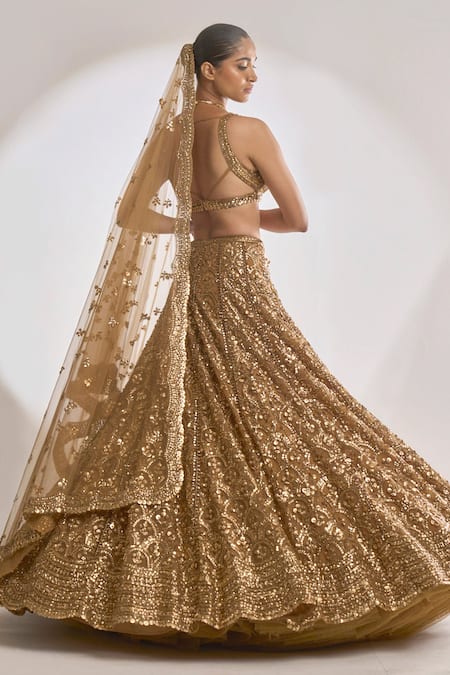 Shop Seema Gujral Gold Net Floral Notched Sequin Work Scallop Pattern Bridal Lehenga Set at Aza Fashions Shop_Seema Gujral_Gold Net Floral Notched Sequin Work Scallop Pattern Bridal Lehenga Set_at_Aza_Fashions