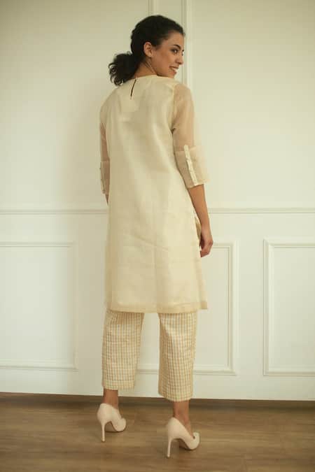 Shop Oja Cream Handloom Silk Floral Applique Round Embroidered Tunic And Pant Set at Aza Fashions Shop_Oja_Cream Handloom Silk Floral Applique Round Embroidered Tunic And Pant Set _at_Aza_Fashions